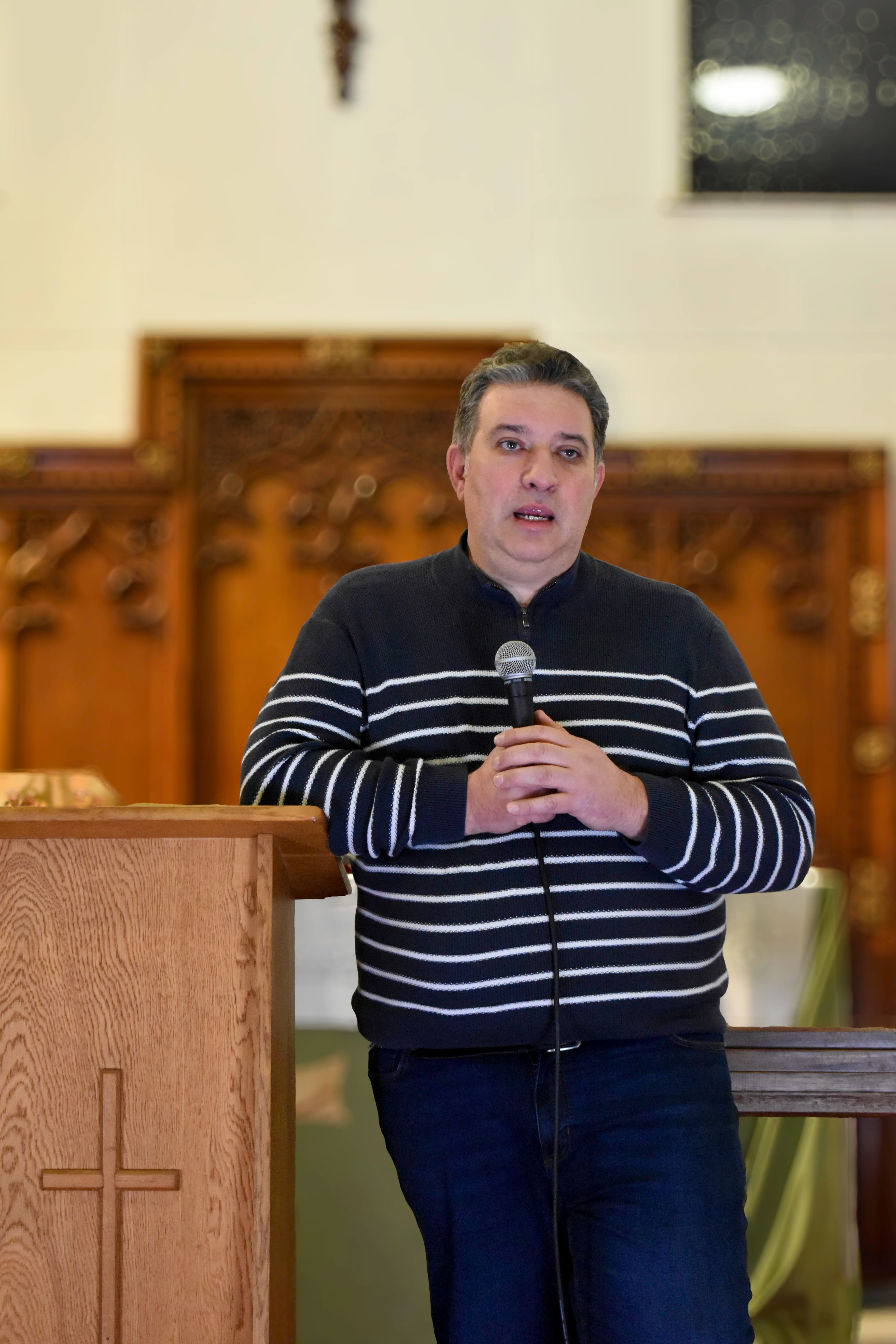Preaching during a worship service at our churches in liverpool
