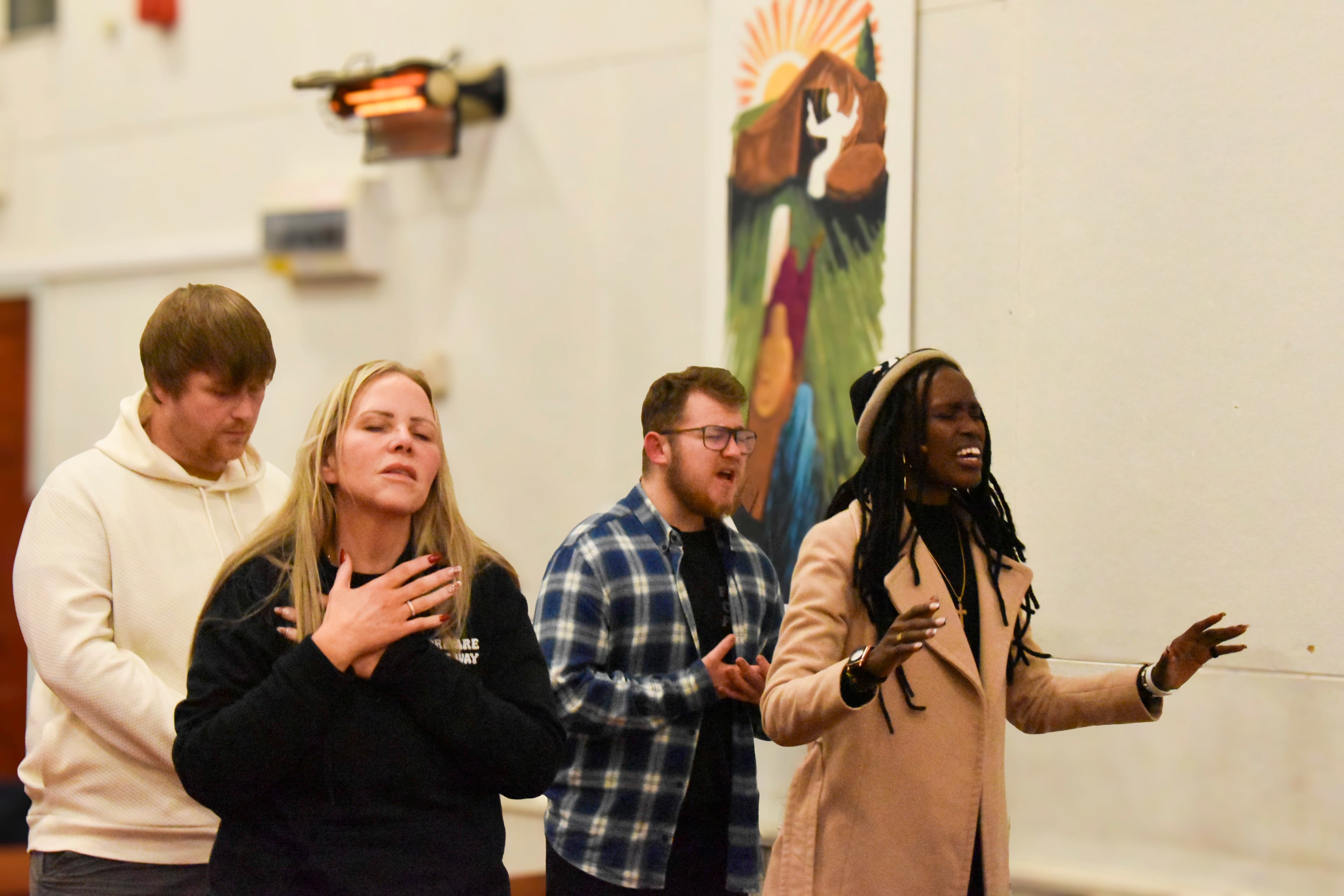 Congregation worshipping during a service at our Church in Liverpool