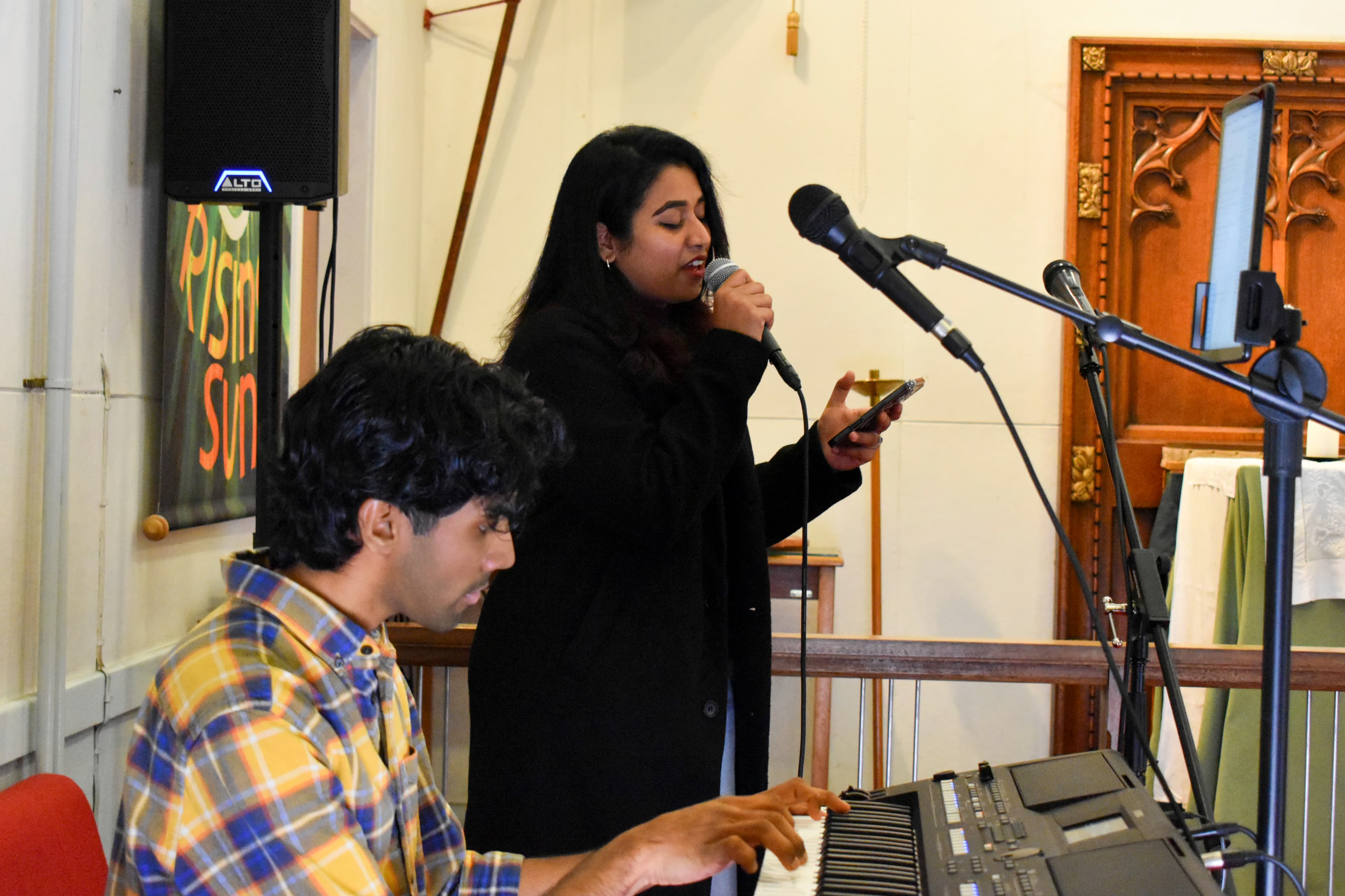 Ayana and Anesh leading live worship at our Church in Liverpool