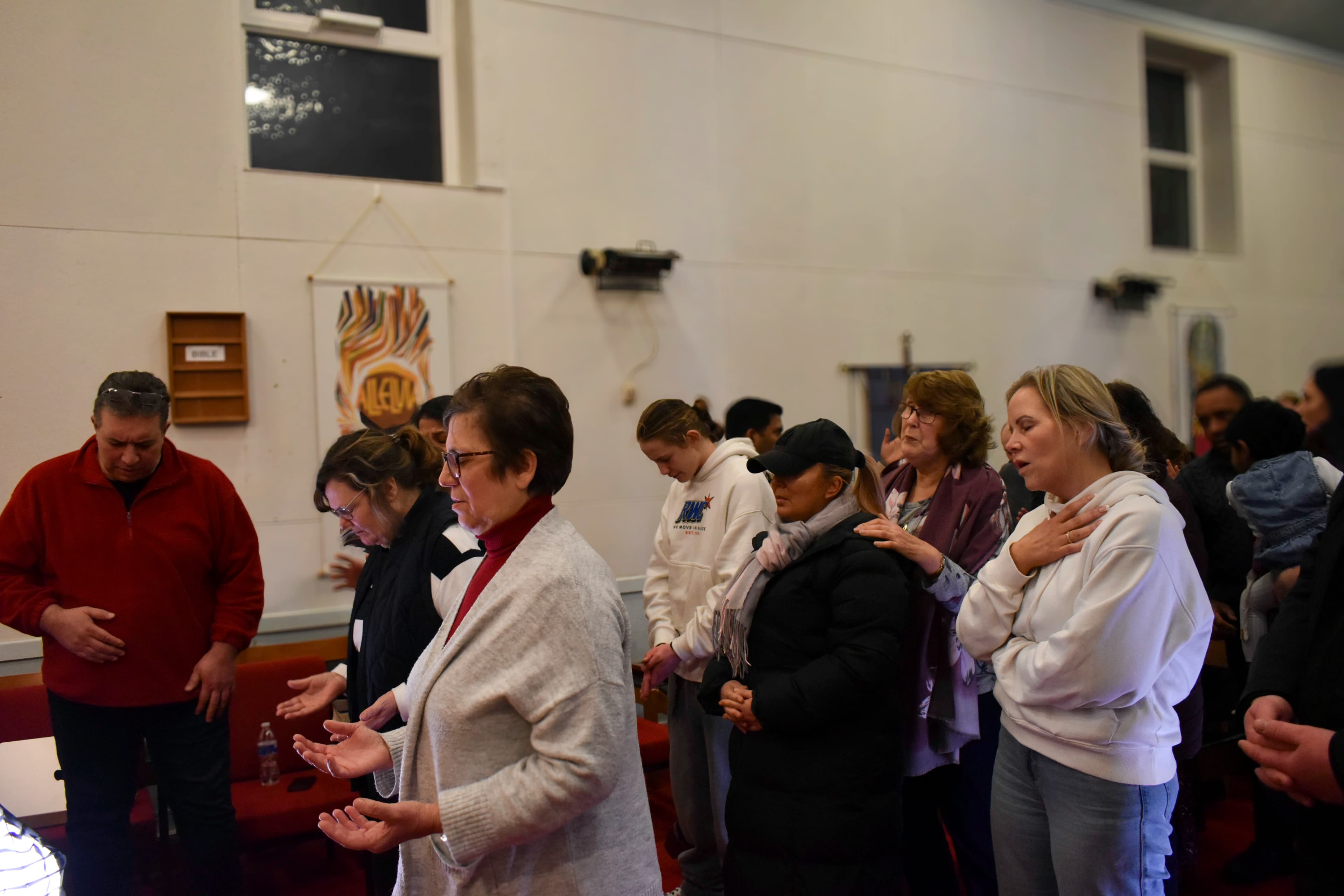 Worship and prayer during a service at our Church in Liverpool