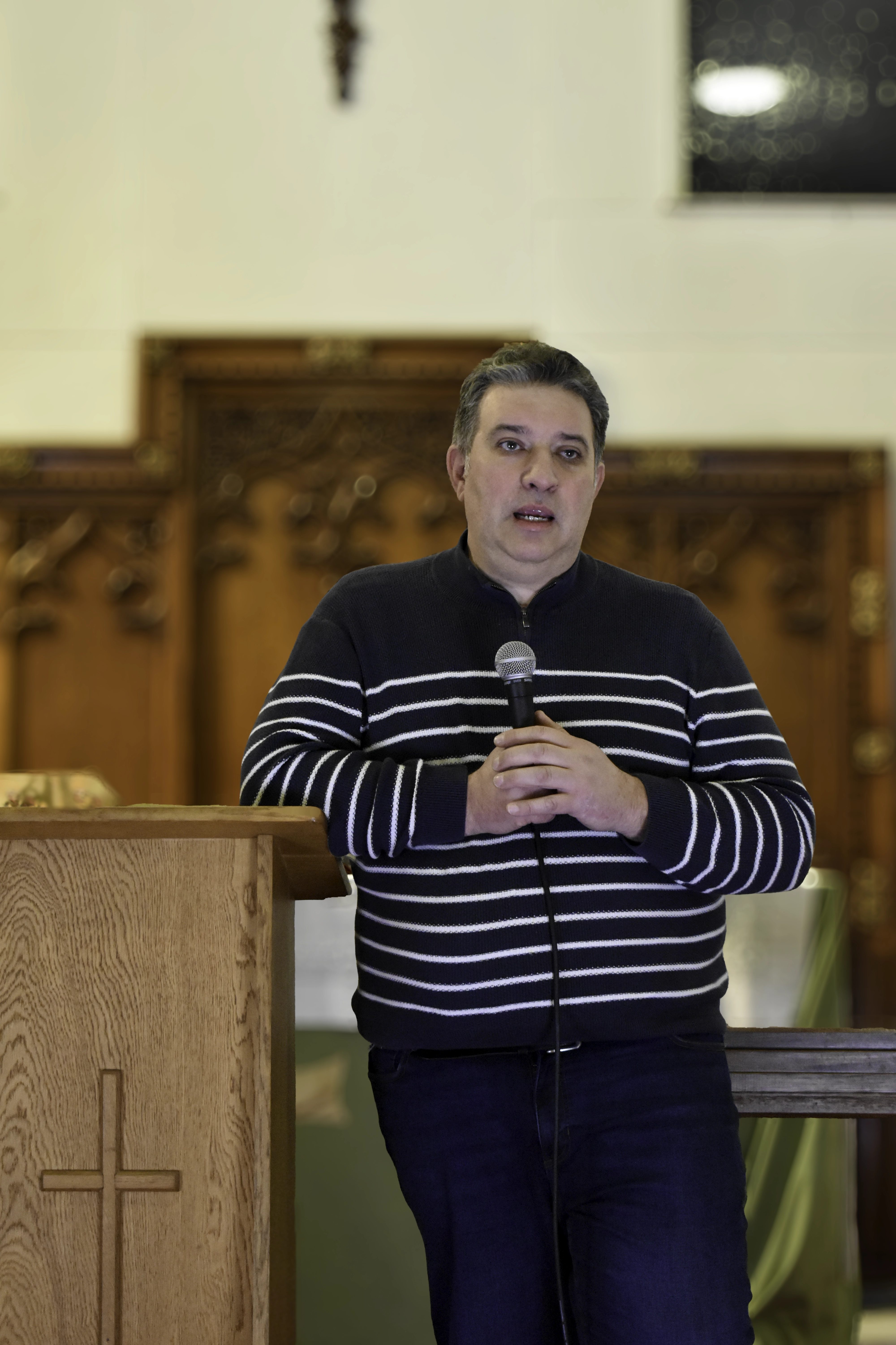 Preaching during a worship service at our Birkenhead Church