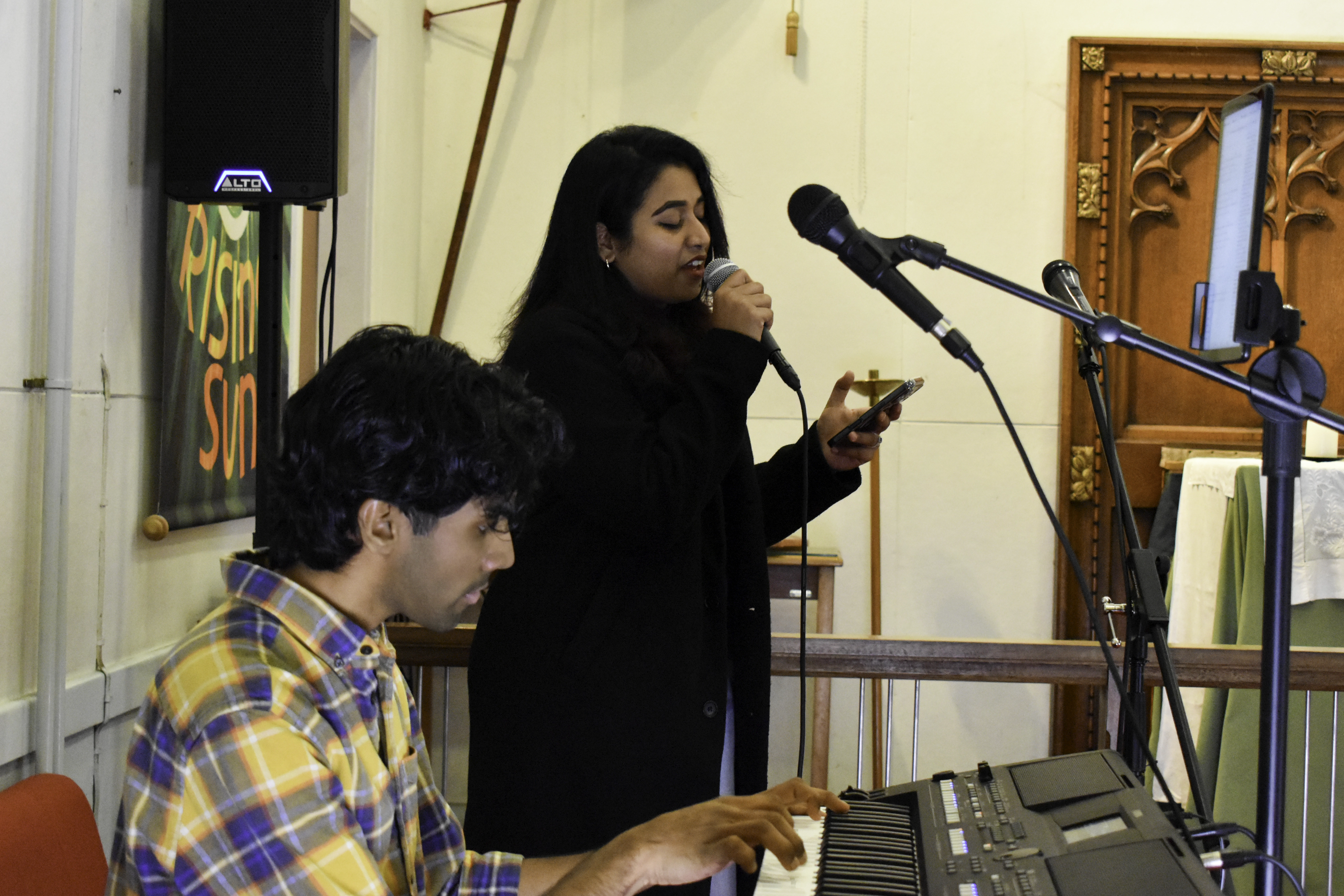 Ayana and Anesh leading live worship at our Church in Liverpool