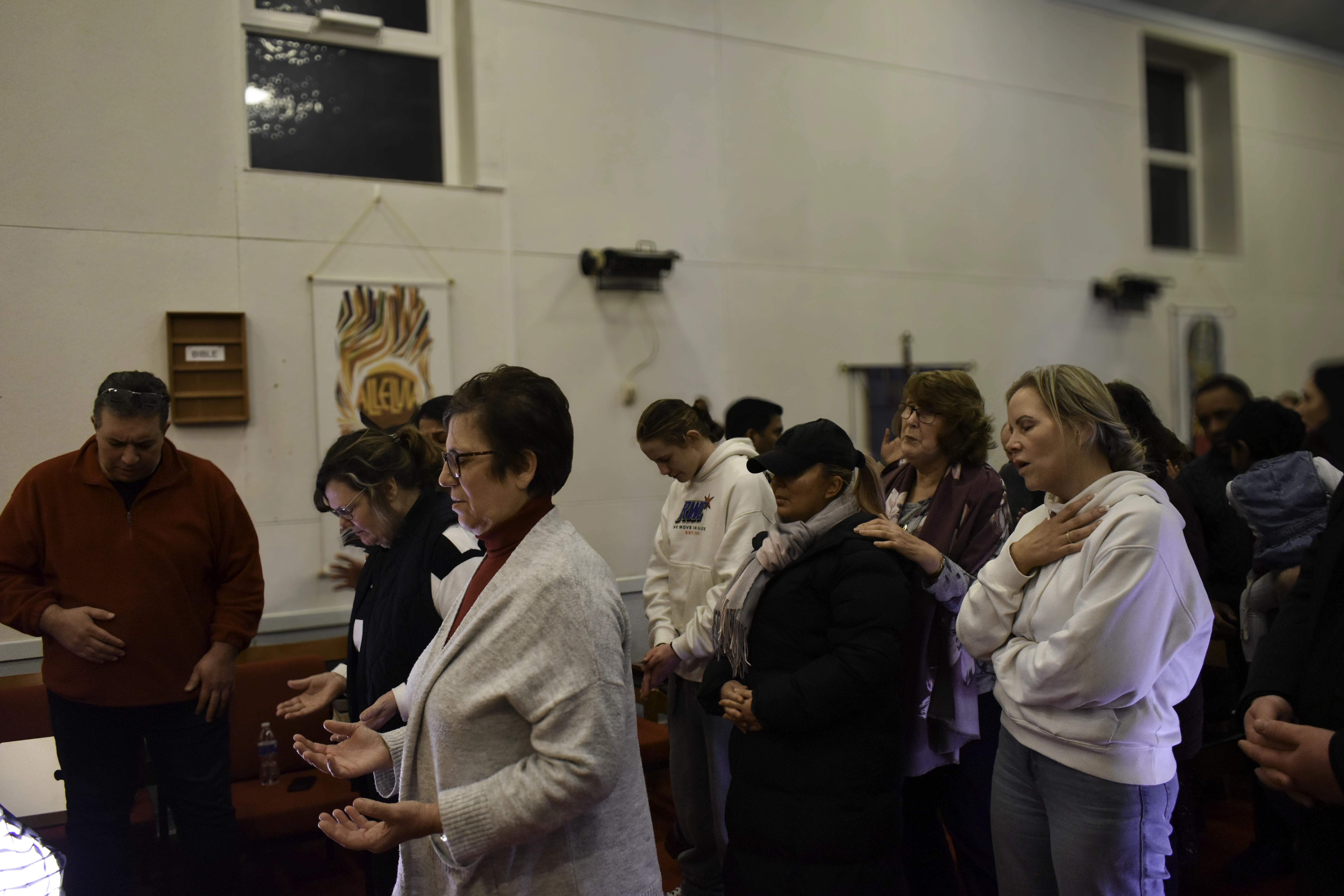 Worship and prayer during a service at our Church in Liverpool